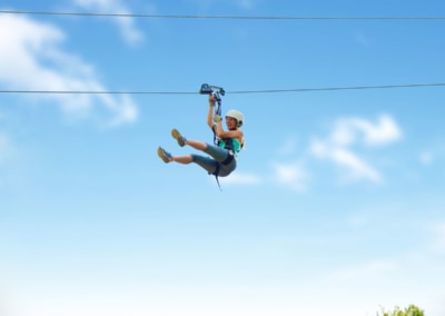 A woman on the dual zip line