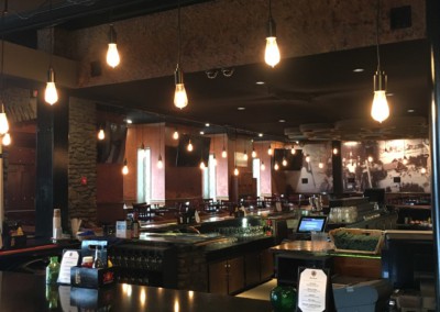 bistro 210 interior bar area with hanging lights