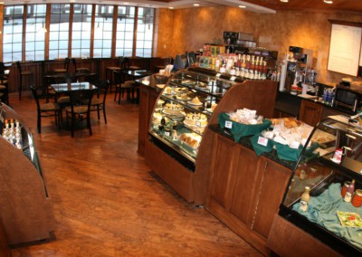 courtyard cafe interior with food in display cases