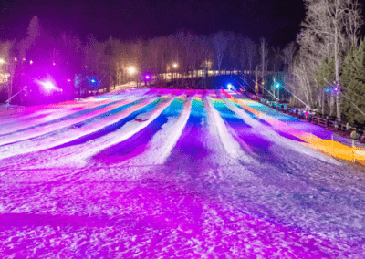 snow tube hill with lights for lunar lights snow tubing