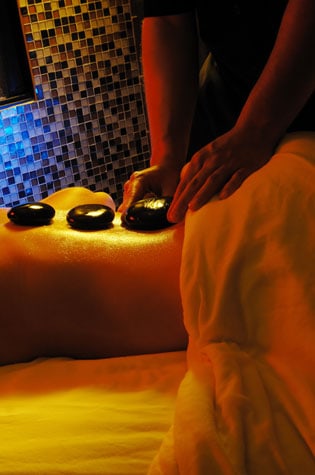 serenity spa massage therapy with hot rocks