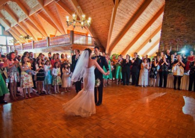 marred couple dancing at the lodge after wedding