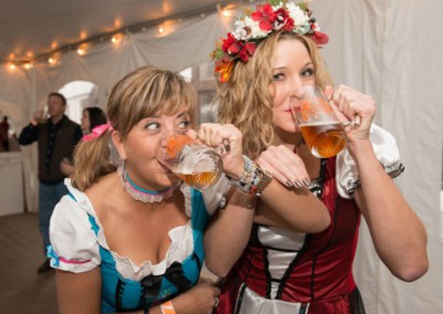 two women drinking beer