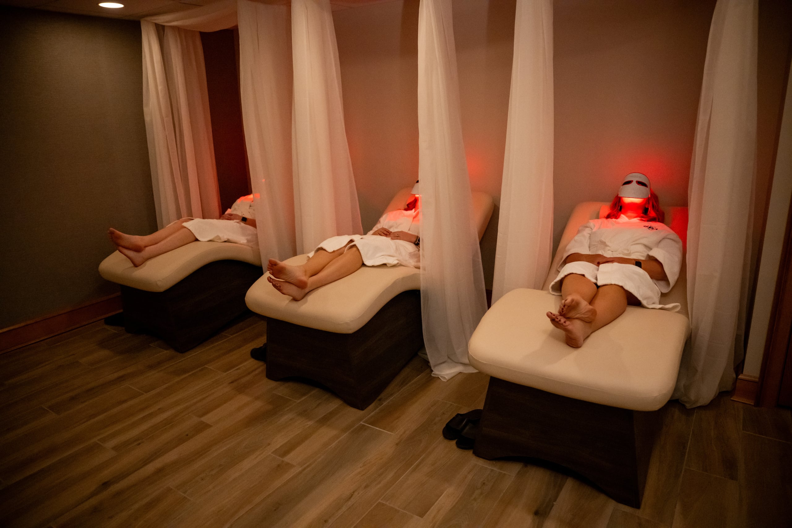 serenity spa interior with flowers and basket of sandals
